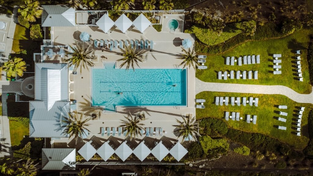 All-Inclusive Resort Tips: What First-Timers Wish They'd Known Before Booking 2 Luxurious all-inclusive resort with multiple pools and palm trees for vacation getaway