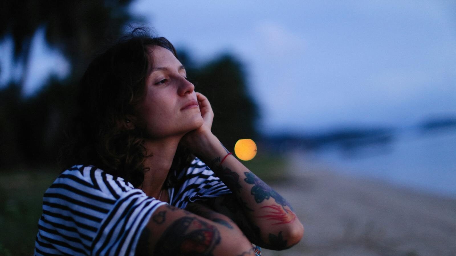 First-time lifestyle cruise attendee managing social anxiety while preparing emotionally for social interactions