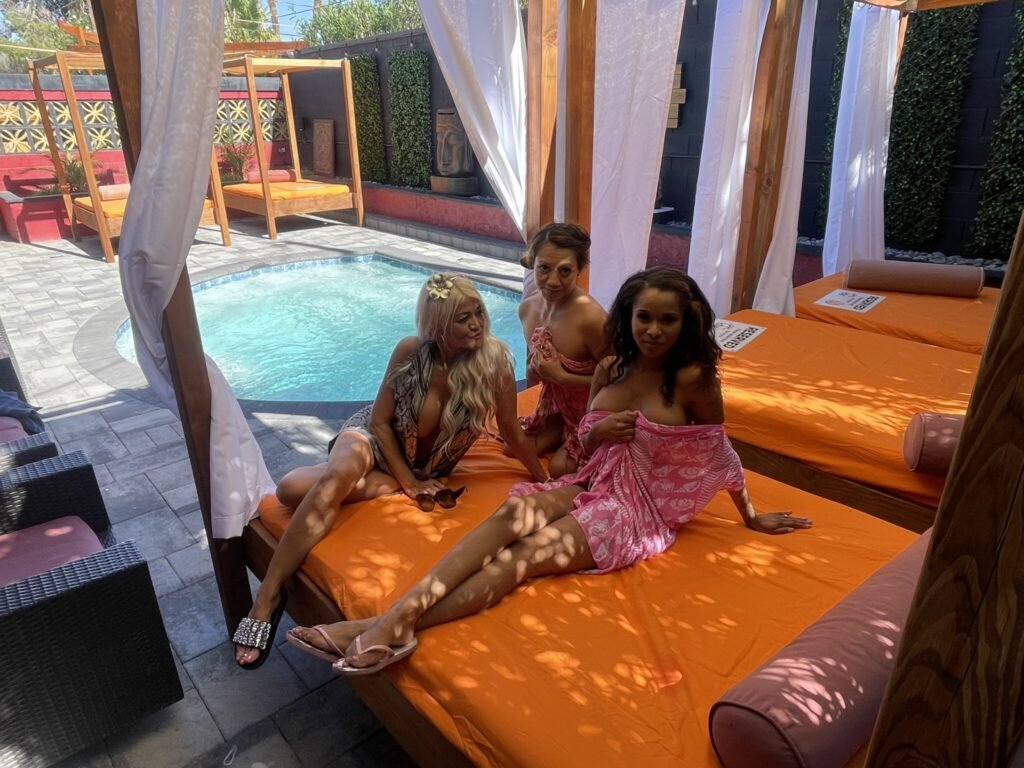 sea mountain las vegas women on day beds by pool